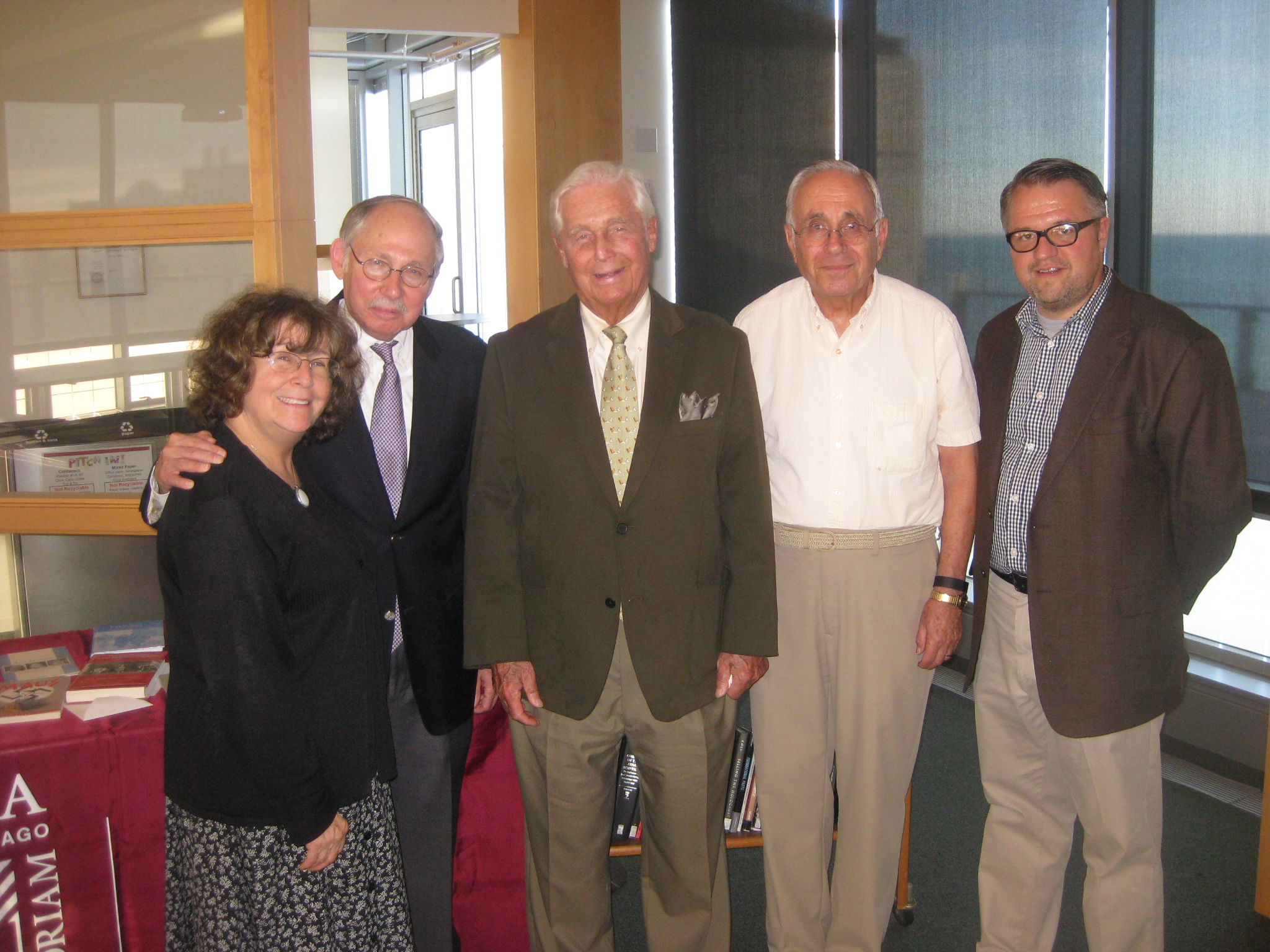 Pictured (from left to right): Patti Ray (Hillel Director Emerita, Loyola University Chicago), Elliot Lefkovitz, John Coath (WWII vet and liberator of Mauthausen concentration camp in Austria), Steen Metz (Danish child survivor of Theresienstadt concentration camp in former Czechoslovakia), Paul Voelker (Director, Information Commons). Photo taken at <a href=